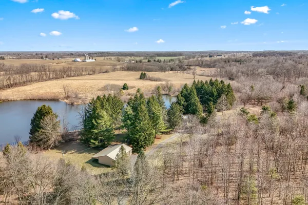 $699,000 | 2175 Bird Lake Road South, Osseo, MI 49266