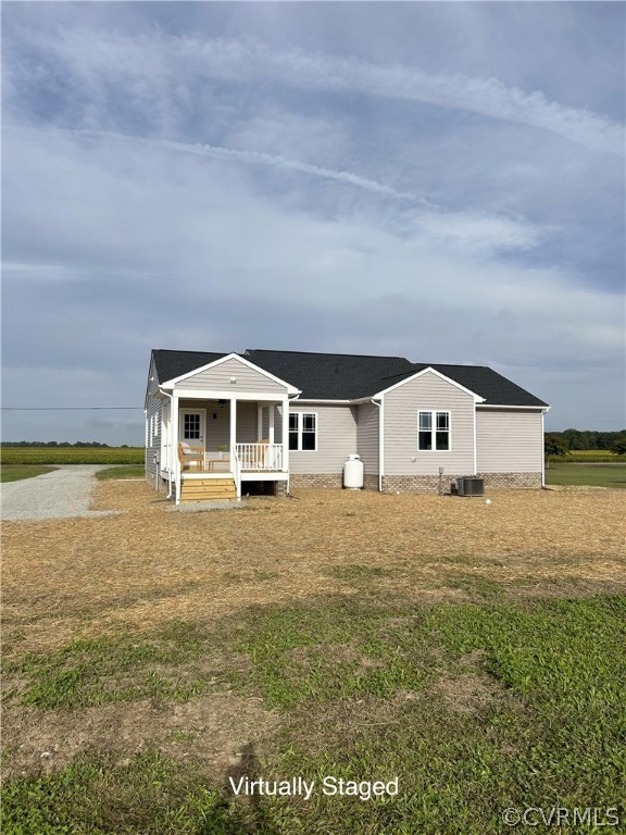 2029 Churchville Road West Point, VA 23181 - Photo 2 of 17 a house with a yard