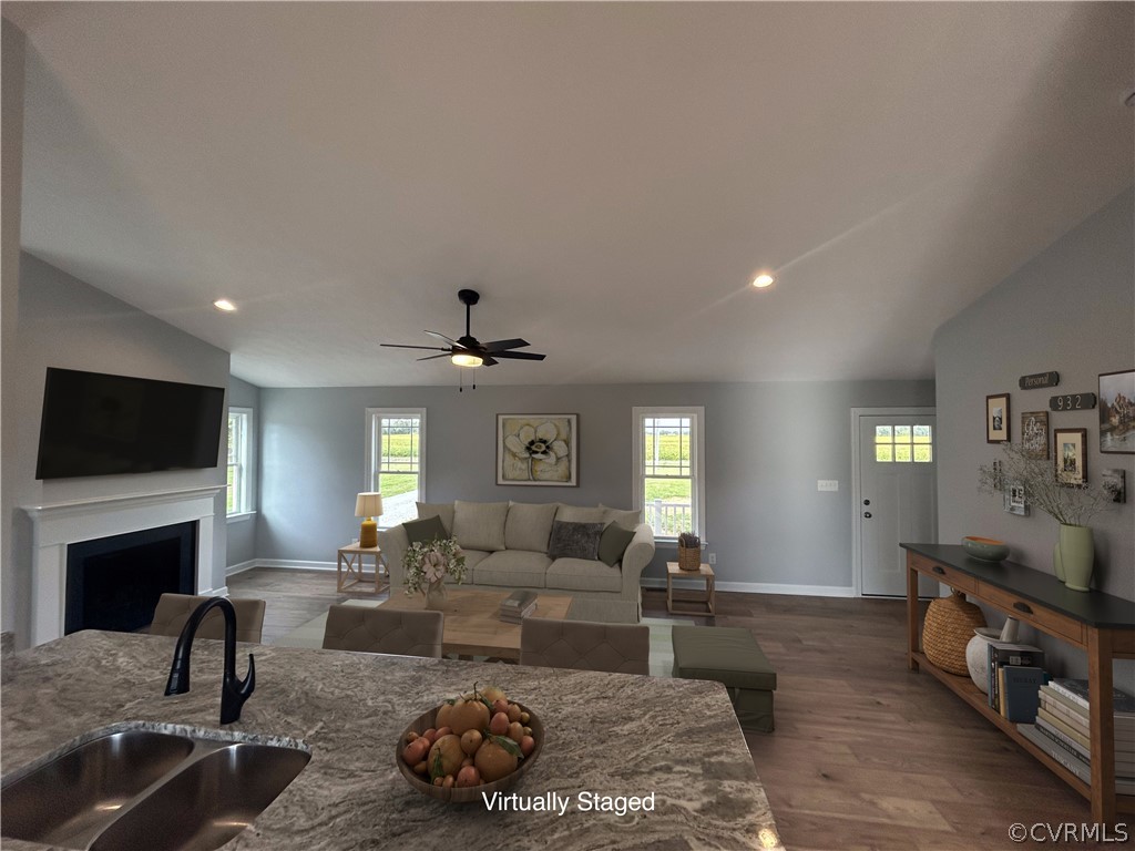2029 Churchville Road West Point, VA 23181 - Photo 5 of 17 a living room with furniture flat screen tv and a fireplace