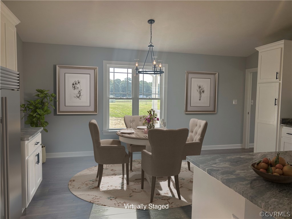 2029 Churchville Road West Point, VA 23181 - Photo 8 of 17 a view of a dining room with furniture window and wooden floor