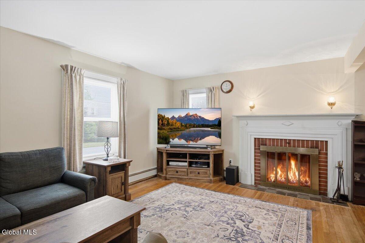 113 Gordon Road Rotterdam, NY 12306 - Photo 10 of 40 living room -fireplace lit