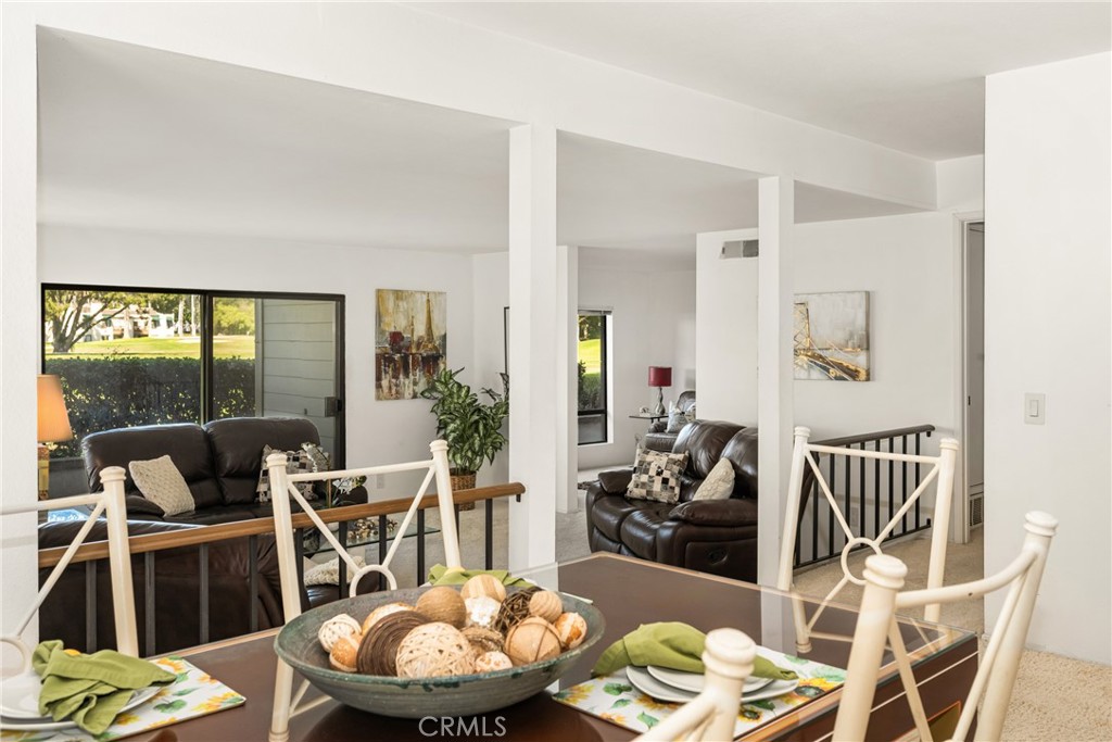 18 Solana Irvine, CA 92612 - Photo 10 of 55 a living room with furniture and a wooden floor
