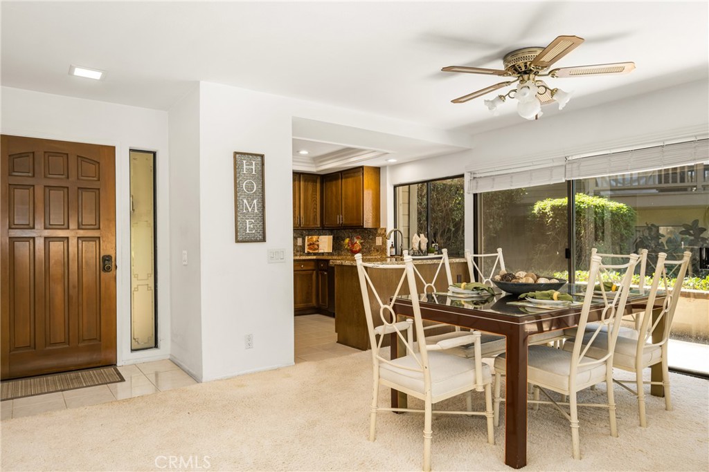 18 Solana Irvine, CA 92612 - Photo 16 of 55 a dining room with furniture and window