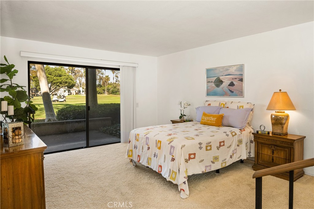 18 Solana Irvine, CA 92612 - Photo 33 of 55 a bedroom with a bed and a night stand