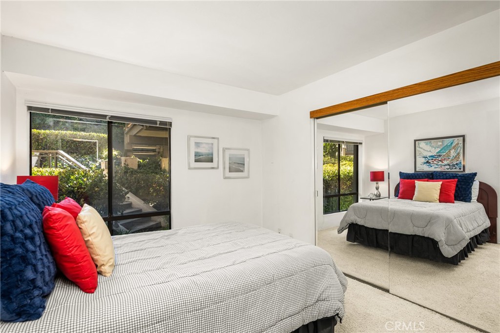 18 Solana Irvine, CA 92612 - Photo 40 of 55 a bedroom with a large bed and a window