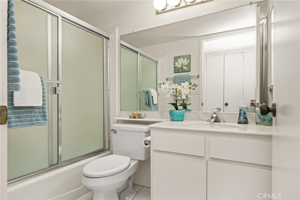 18 Solana Irvine, CA 92612 - Photo 42 of 55 a bathroom with a sink toilet and shower