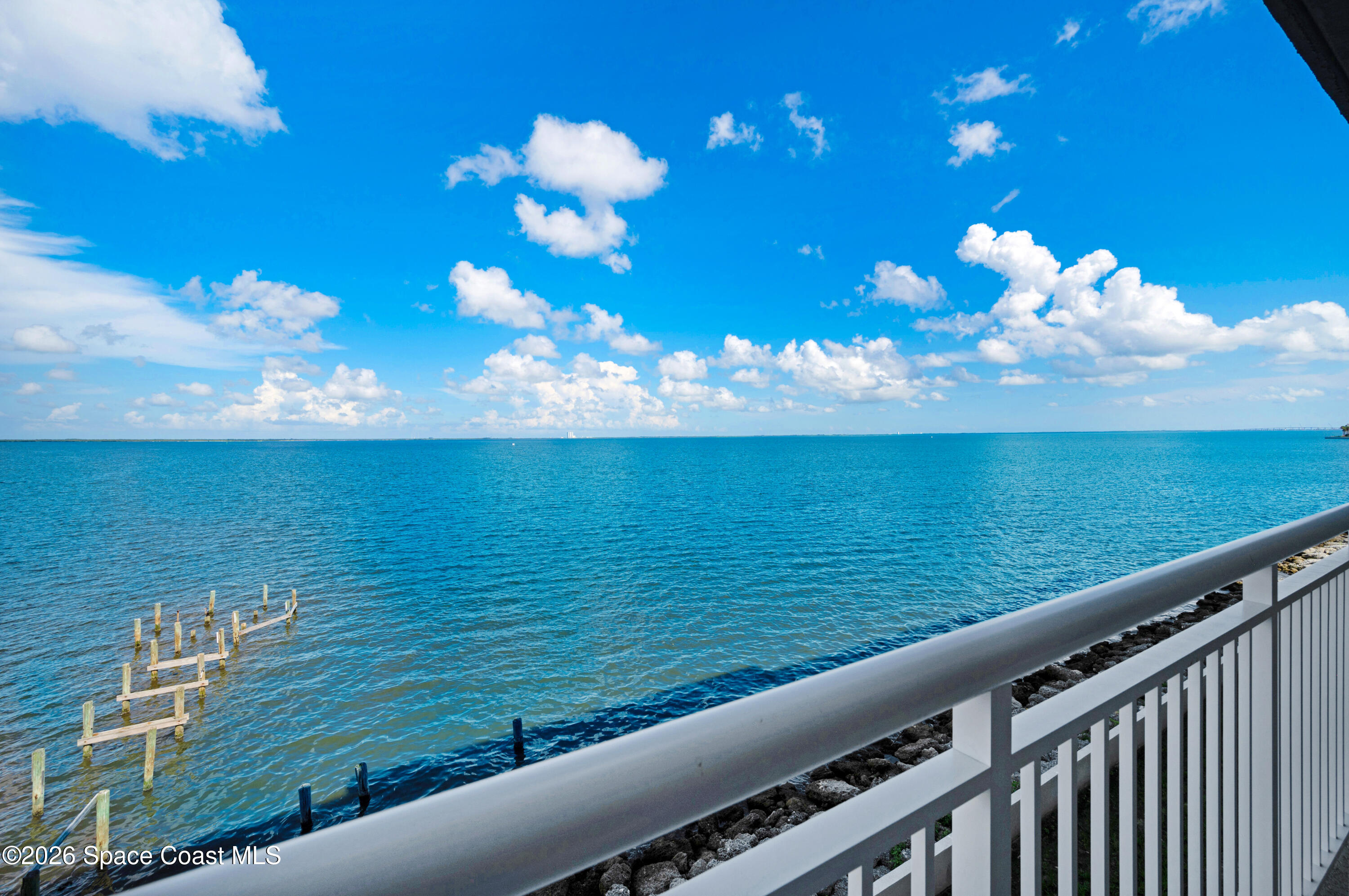 1805 Riverside Drive, Unit 304 Titusville, FL 32780 - Photo 32 of 46 a view of a balcony with an ocean view