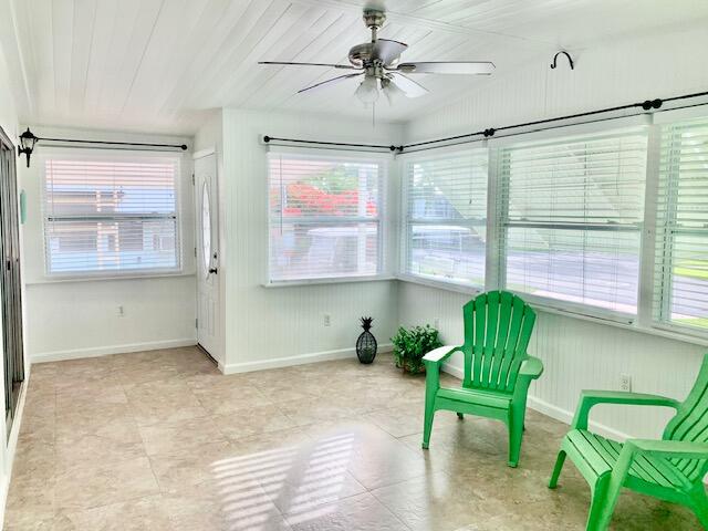 808 South Silver Circle Key Largo, FL 33037 - Photo 17 of 50 a living room with furniture and a window