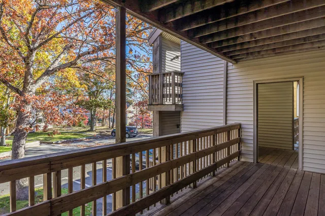 a view of a street from a balcony