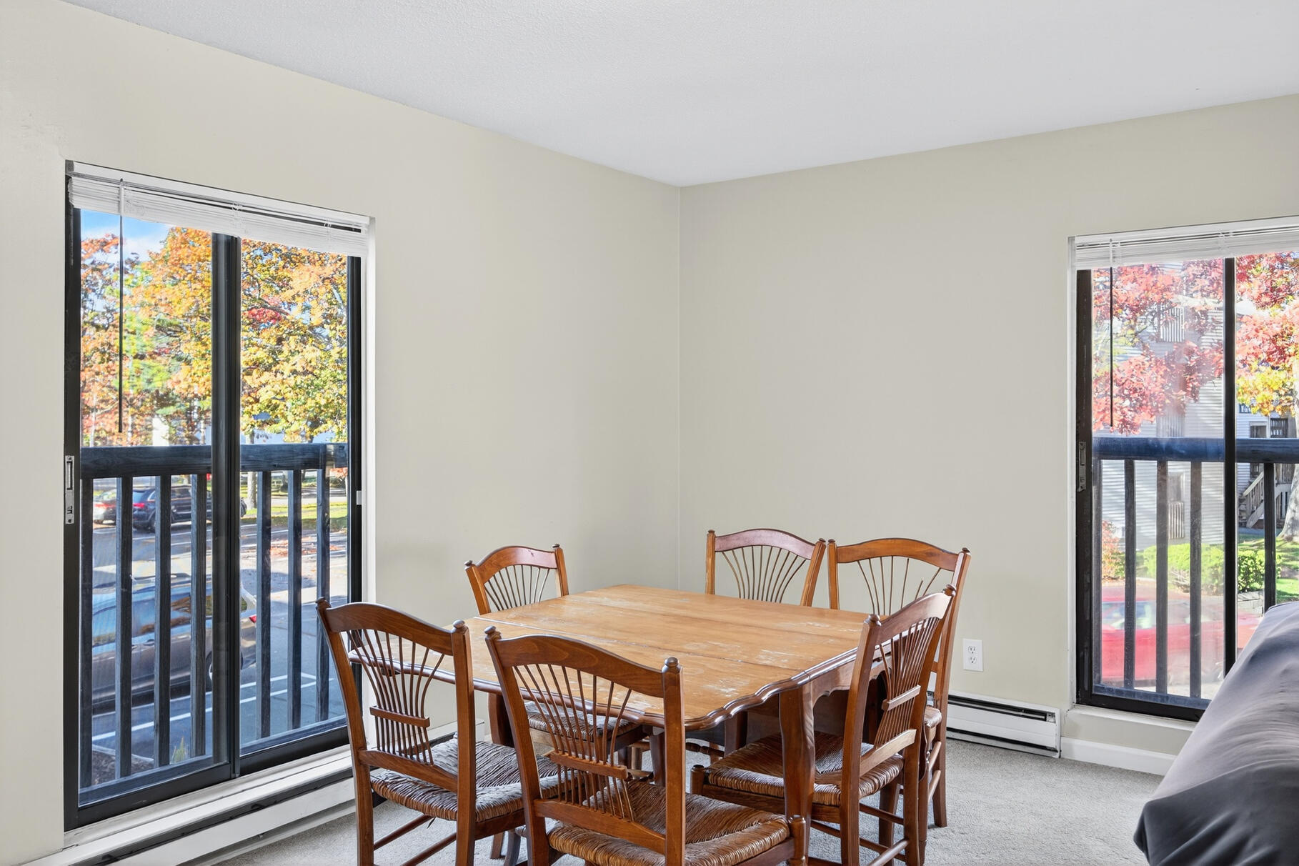 800 Bearses Way, Unit 1NE Hyannis, MA 02601 - Photo 8 of 27 a dining room with furniture and window