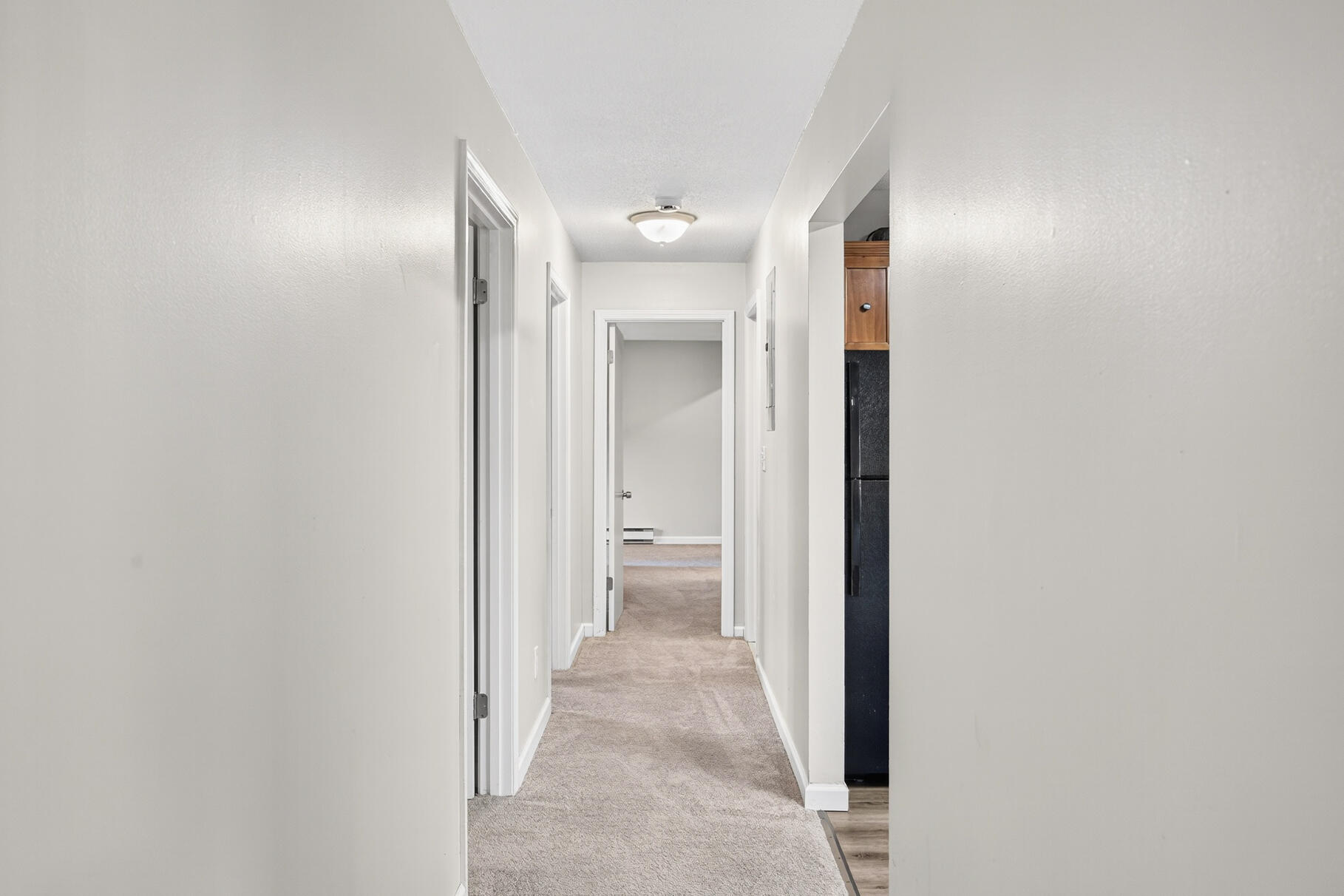 800 Bearses Way, Unit 1NE Hyannis, MA 02601 - Photo 10 of 27 a view of a hallway