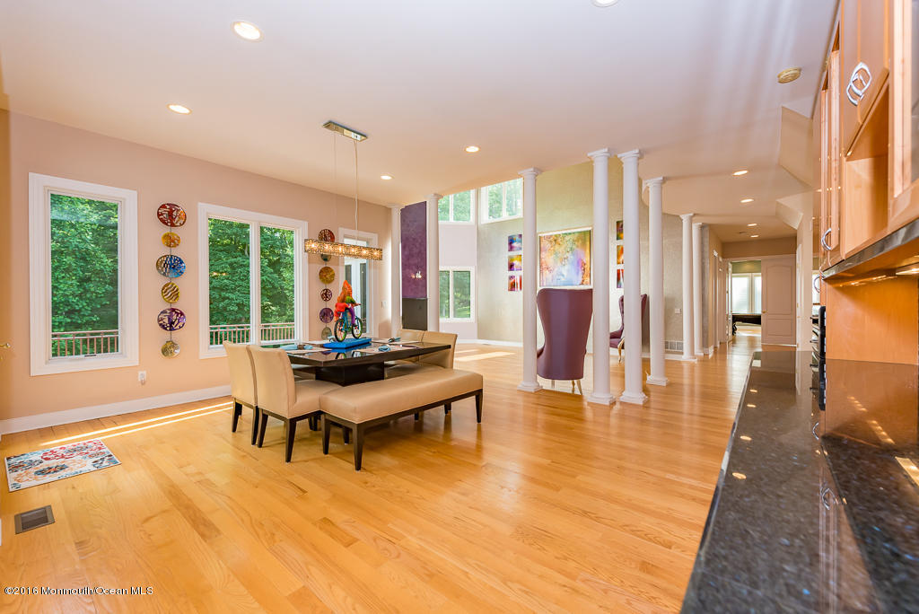 500 Farm Bridge Road Marlboro, NJ 07746 - Photo 20 of 57 a living room with furniture and large windows