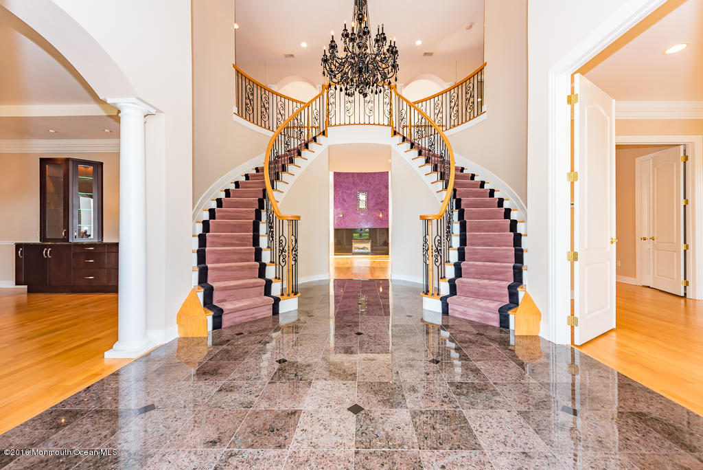 500 Farm Bridge Road Marlboro, NJ 07746 - Photo 7 of 57 a view of entryway and hall with a dining room