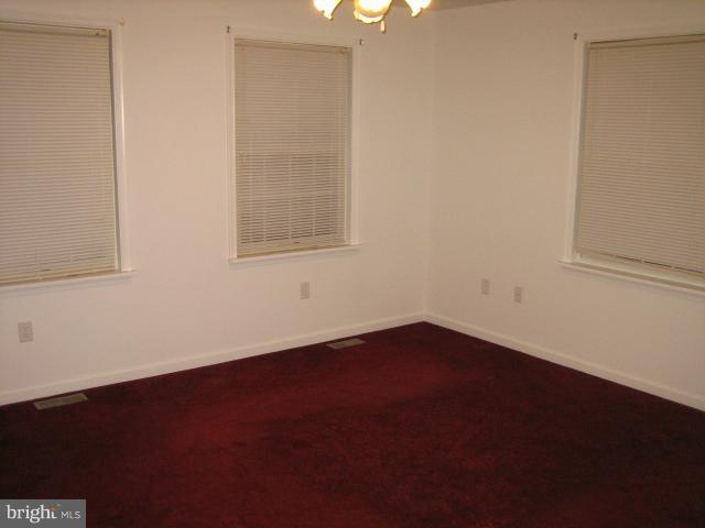1213 Krueger Avenue Rosedale, MD 21237 - Photo 18 of 27 an empty room with a window