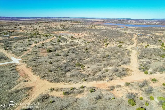 a view of beach and an ocean