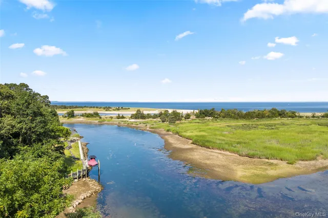 a view of an ocean and city