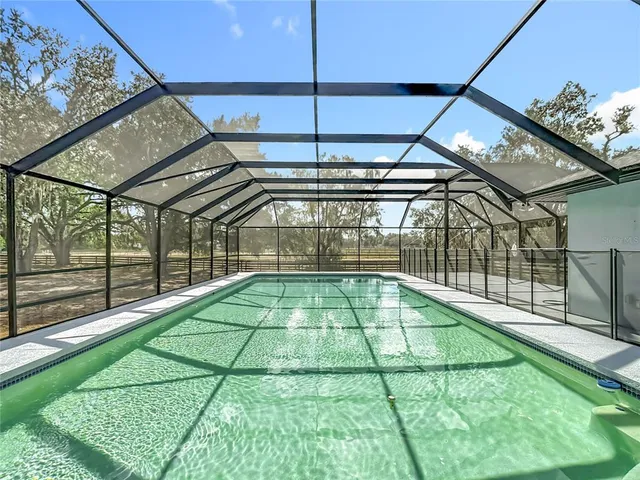 a view of an outdoor space and swimming pool