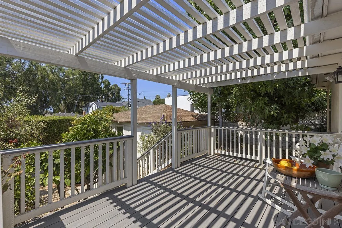 5532 Bellevue Avenue La Jolla, CA 92037 - Photo 14 of 26 a view of a porch with wooden floor barbeque and outdoor seating