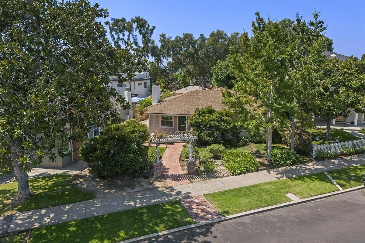 5532 Bellevue Avenue La Jolla, CA 92037 - Photo 2 of 26 a front view of a house with a yard