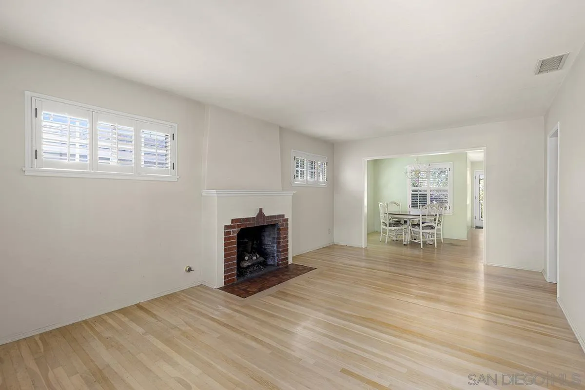 5532 Bellevue Avenue La Jolla, CA 92037 - Photo 4 of 26 a living room with furniture and a fireplace