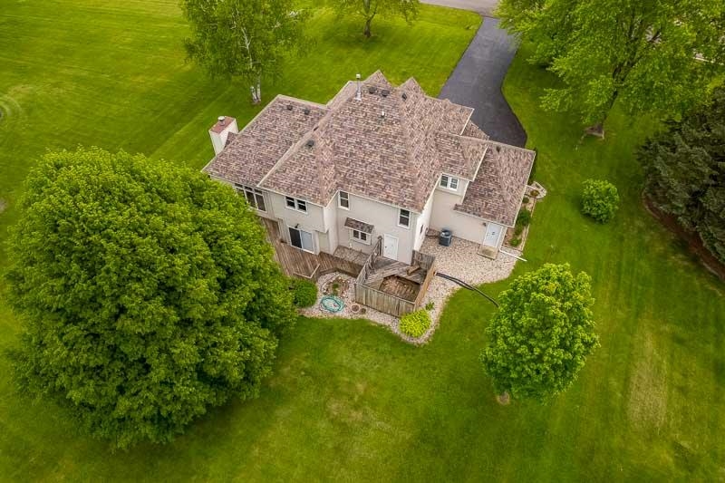 8833 West Ridge Drive Belvidere, IL 61008 - Photo 17 of 65 an aerial view of a house with a garden