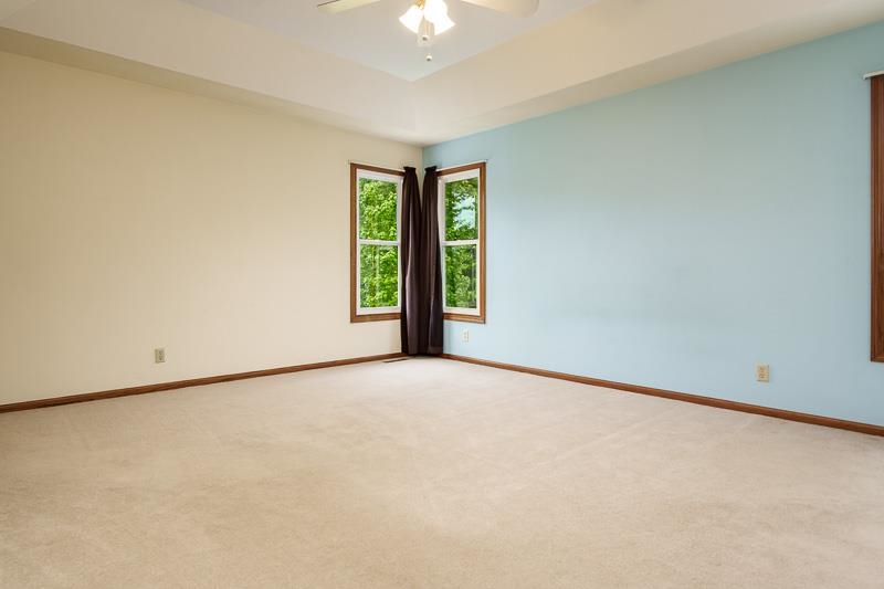8833 West Ridge Drive Belvidere, IL 61008 - Photo 42 of 65 an empty room with windows and closet