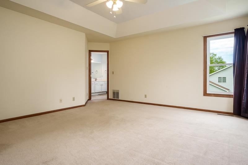 8833 West Ridge Drive Belvidere, IL 61008 - Photo 43 of 65 an empty room with windows