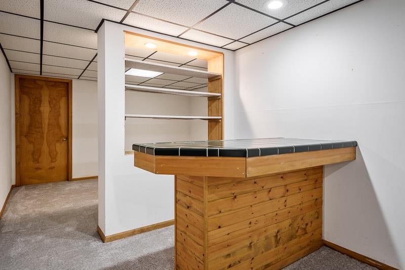 8833 West Ridge Drive Belvidere, IL 61008 - Photo 60 of 65 a view of walk in closet with empty racks