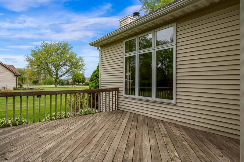 8833 West Ridge Drive Belvidere, IL 61008 - Photo 6 of 65 a view of a wooden deck
