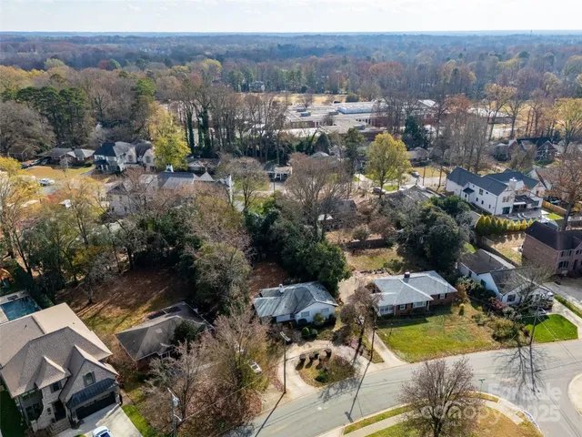 an aerial view of residential house with outdoor space