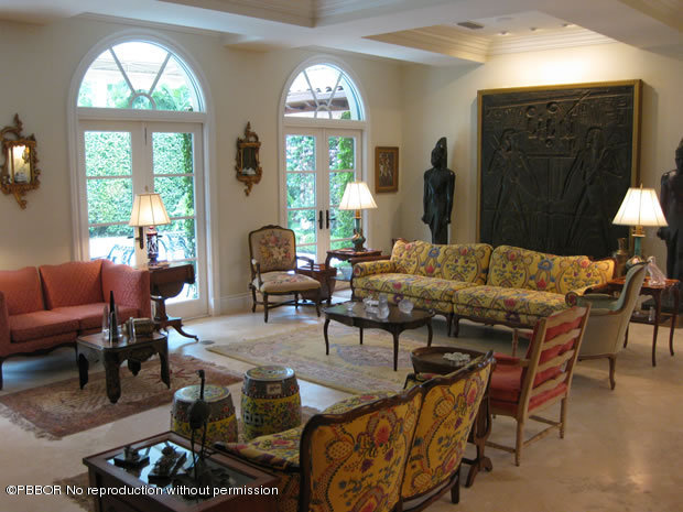 206 Dunbar Road Palm Beach, FL 33480 - Photo 4 of 10 a living room with furniture a large window and wooden floor