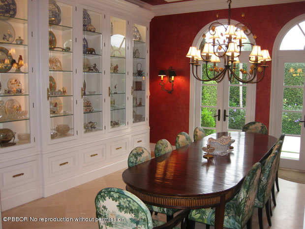 206 Dunbar Road Palm Beach, FL 33480 - Photo 5 of 10 a view of a dining room with furniture and chandelier