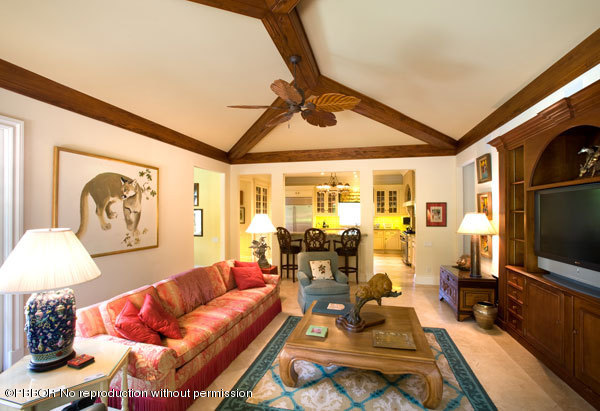 206 Dunbar Road Palm Beach, FL 33480 - Photo 6 of 10 a living room with furniture and a flat screen tv