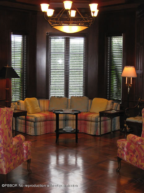 206 Dunbar Road Palm Beach, FL 33480 - Photo 8 of 10 a living room with furniture and a large window