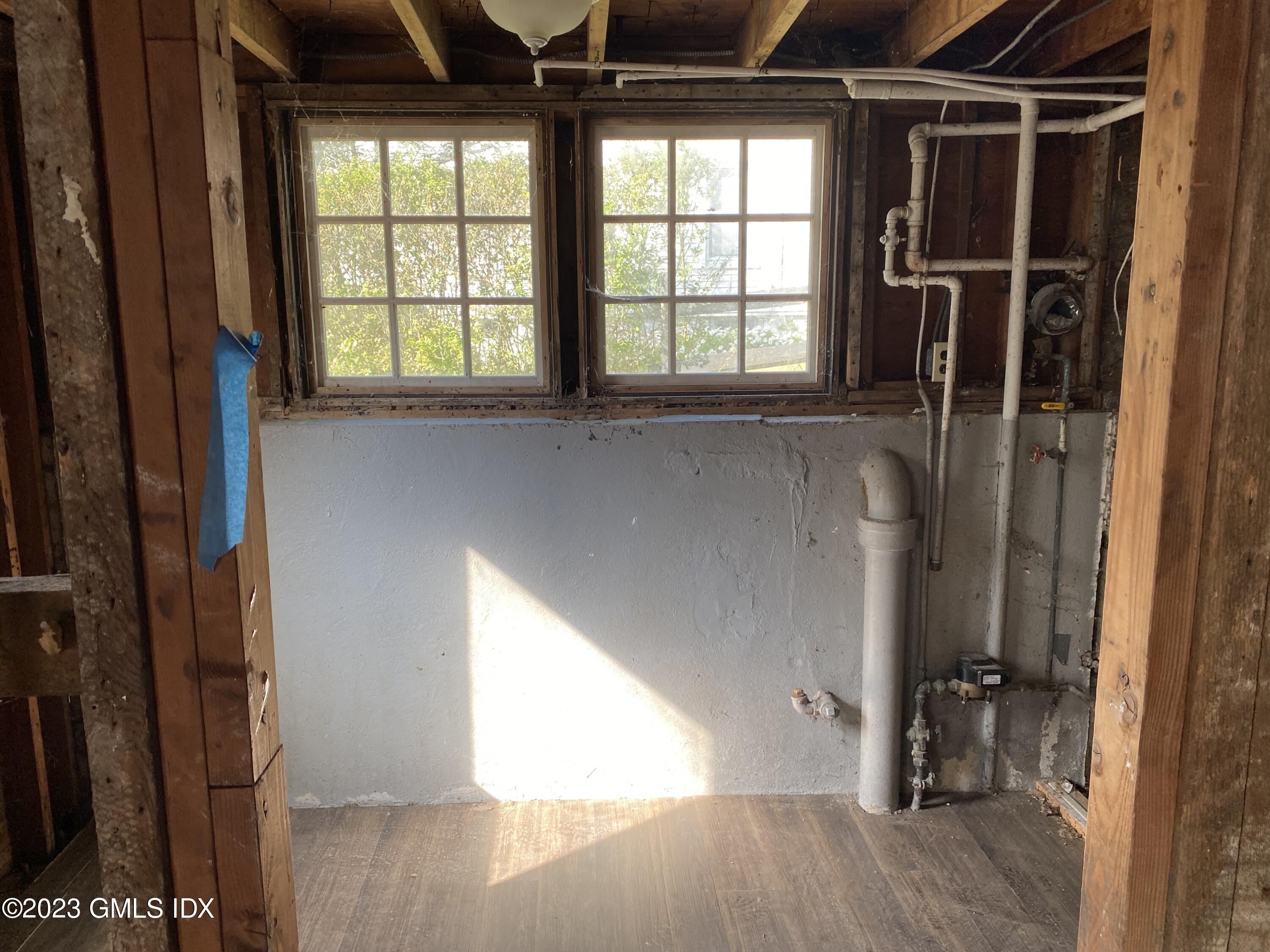 134 Byram Road Greenwich, CT 06830 - Photo 12 of 15 a view of an empty room with a window