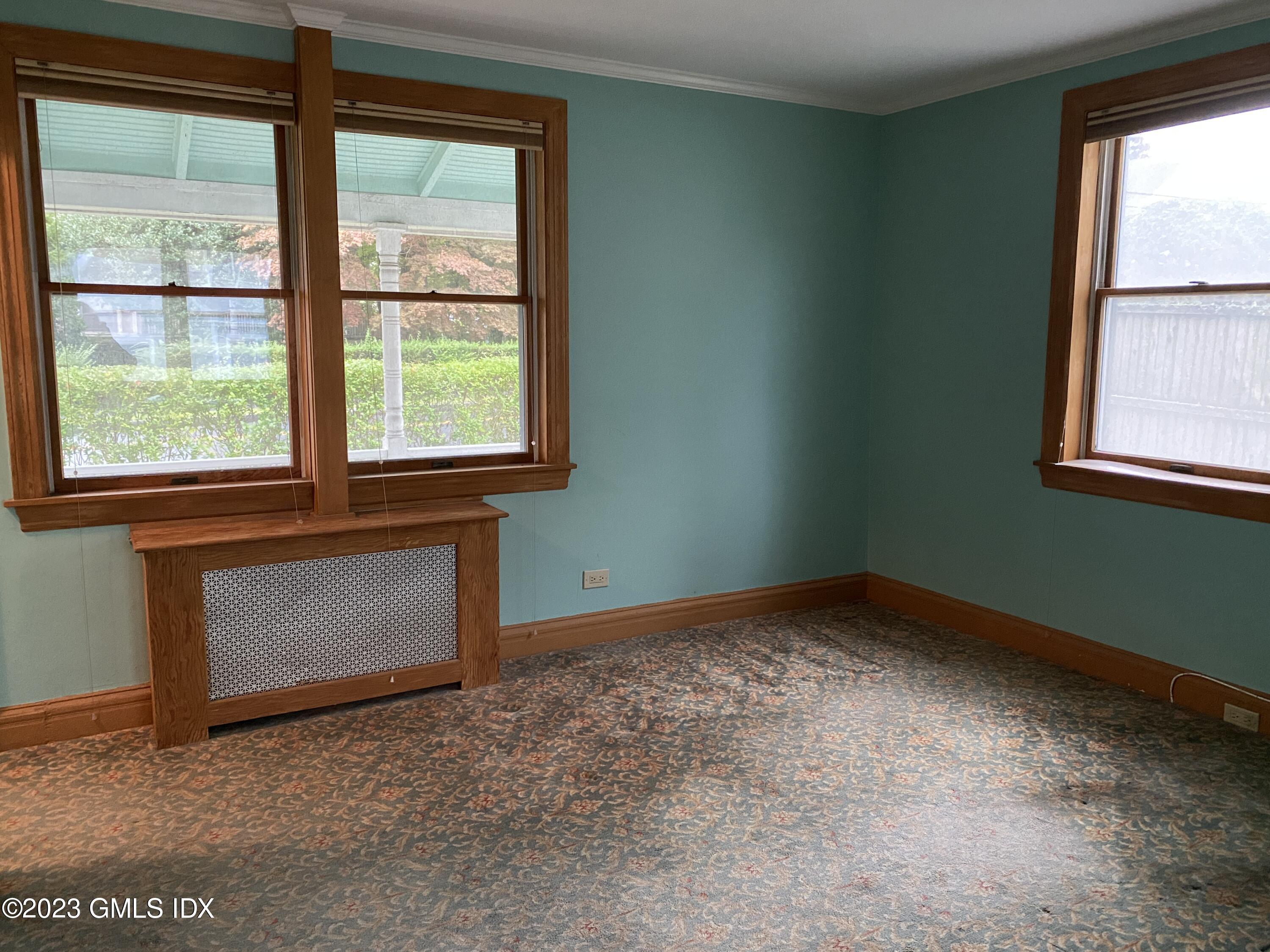 134 Byram Road Greenwich, CT 06830 - Photo 4 of 15 an empty room with a window
