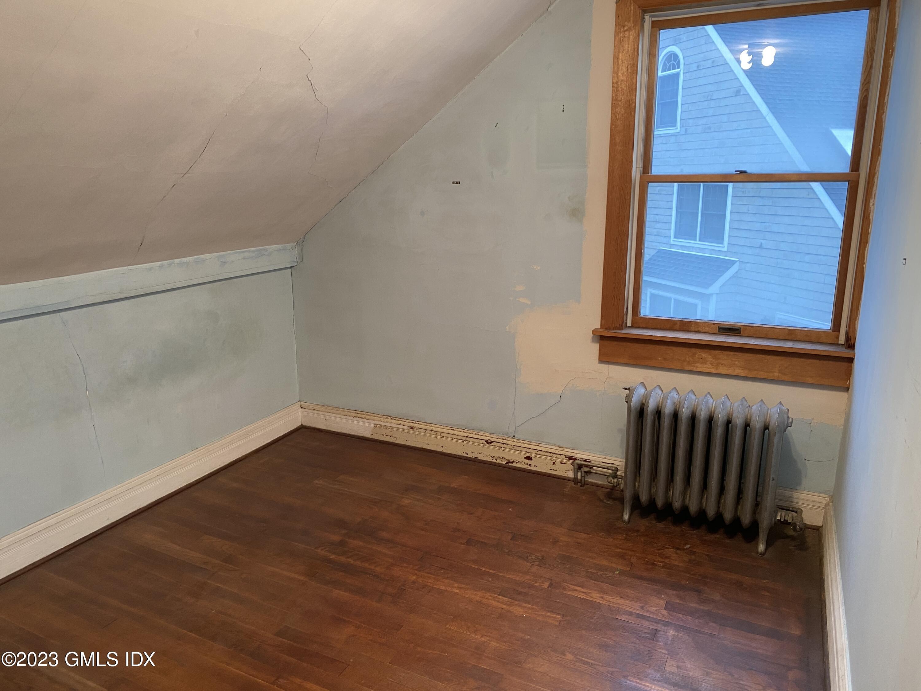 134 Byram Road Greenwich, CT 06830 - Photo 10 of 15 a view of an empty room with a window