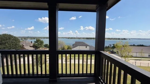 a view of a balcony with lake view