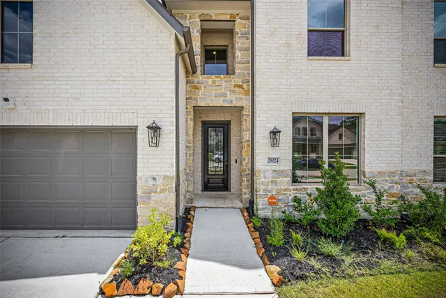 a entryway with flower pots