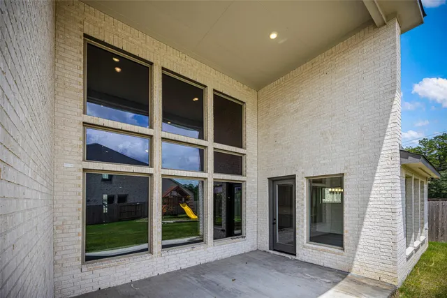 a view of houses with swimming pool
