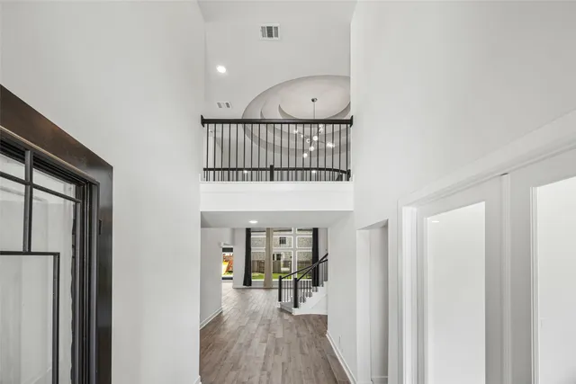 a view of a livingroom with furniture and wooden floor
