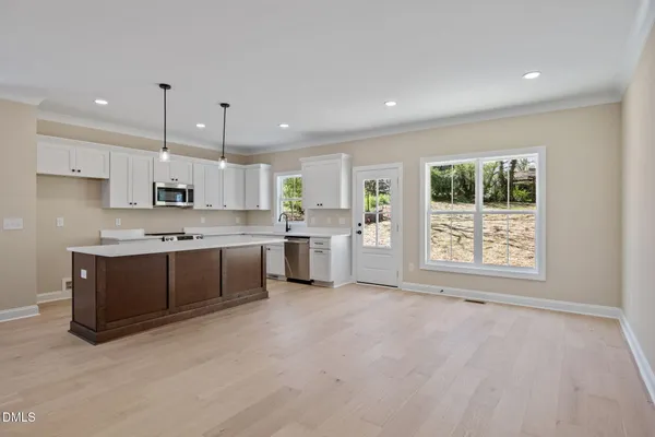 a living room with furniture and a table
