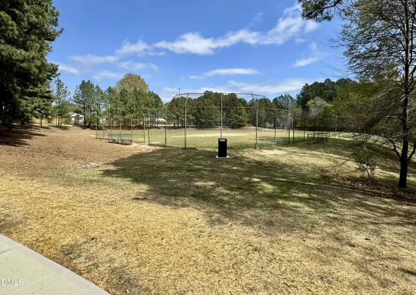 a view of a street with sitting area