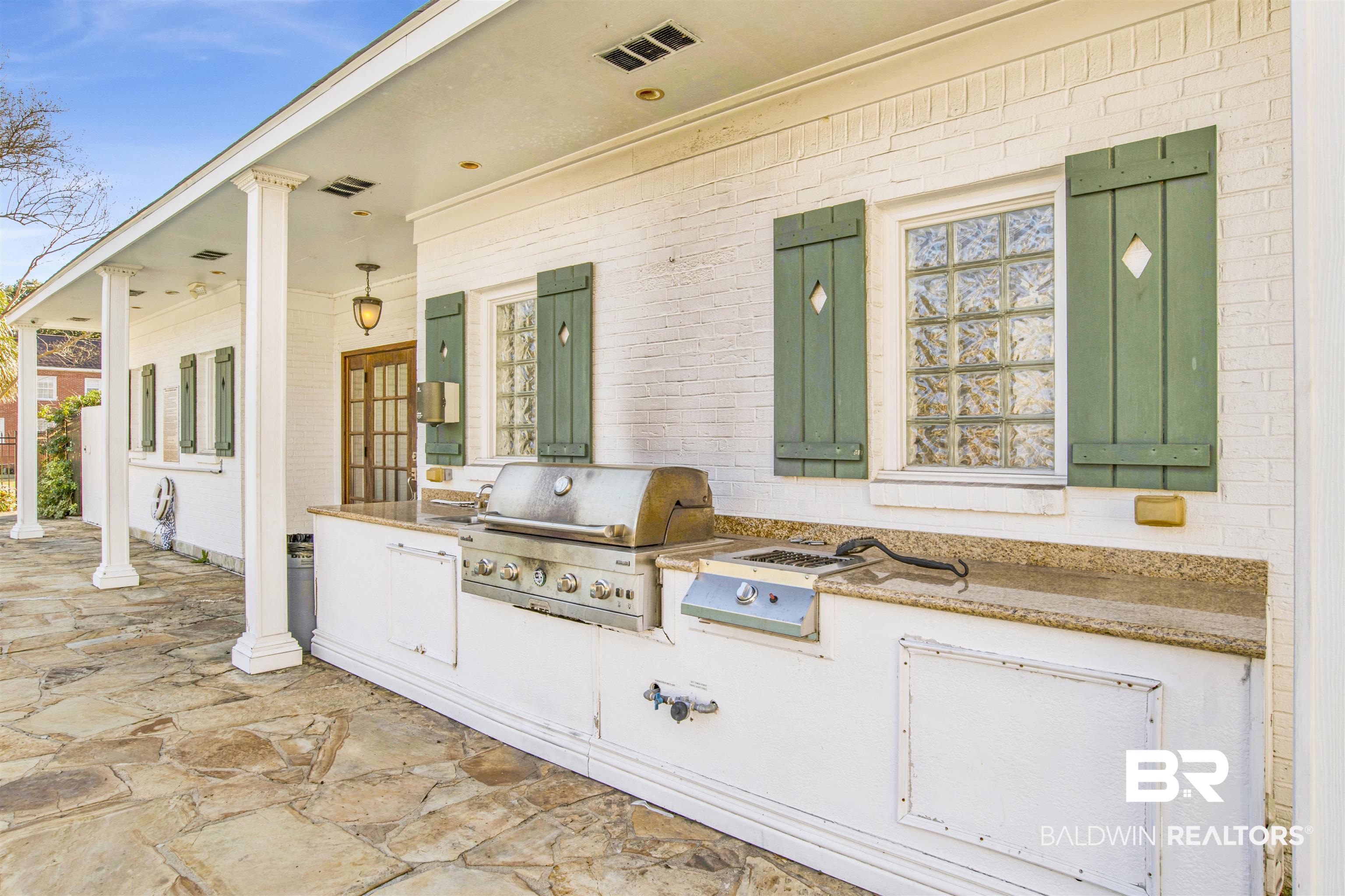 214 Upham Street, Unit 7A Mobile, AL 36607 - Photo 31 of 35 View of patio with an outdoor kitchen