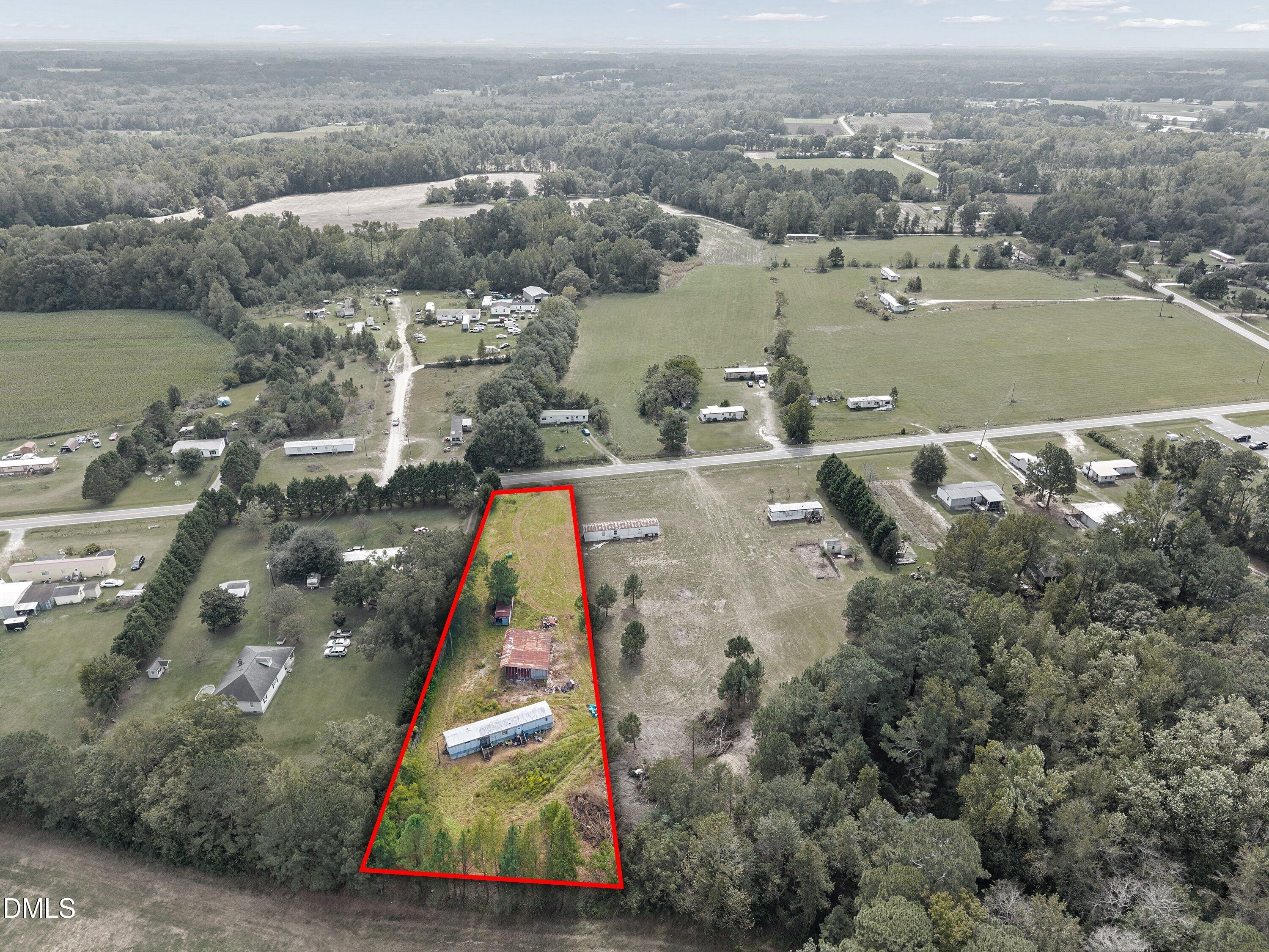 430 Webb Mill Road Four Oaks, NC 27524 - Photo 4 of 6 an aerial view of residential houses with outdoor space