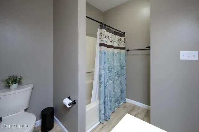 a bathroom with a sink vanity and mirror