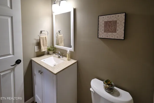 a utility room with cabinets