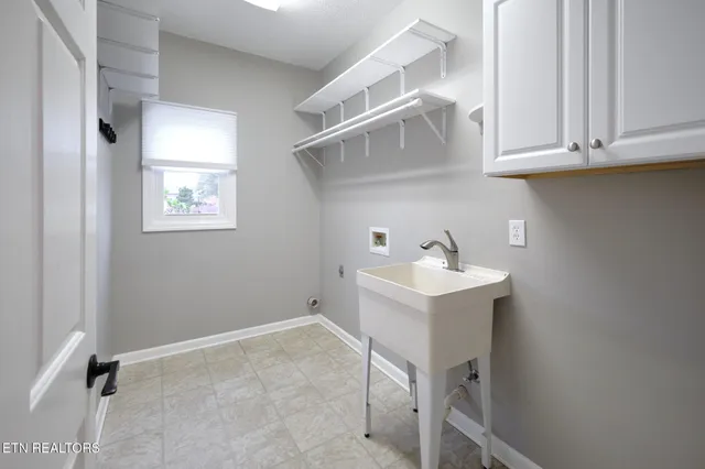 a view of a patio with table and chairs and wooden floor