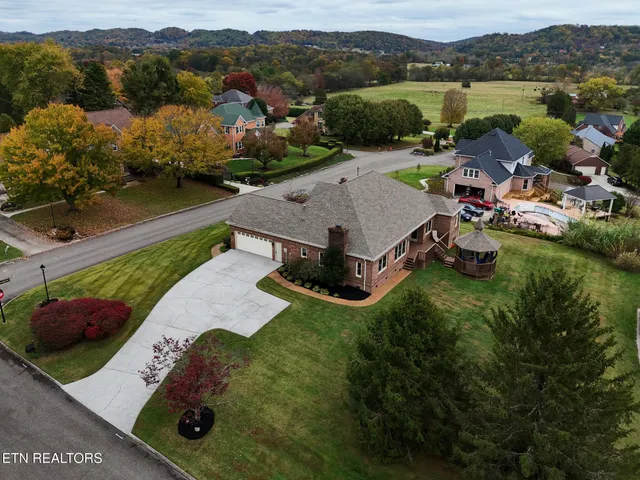 a aerial view of a house with garden