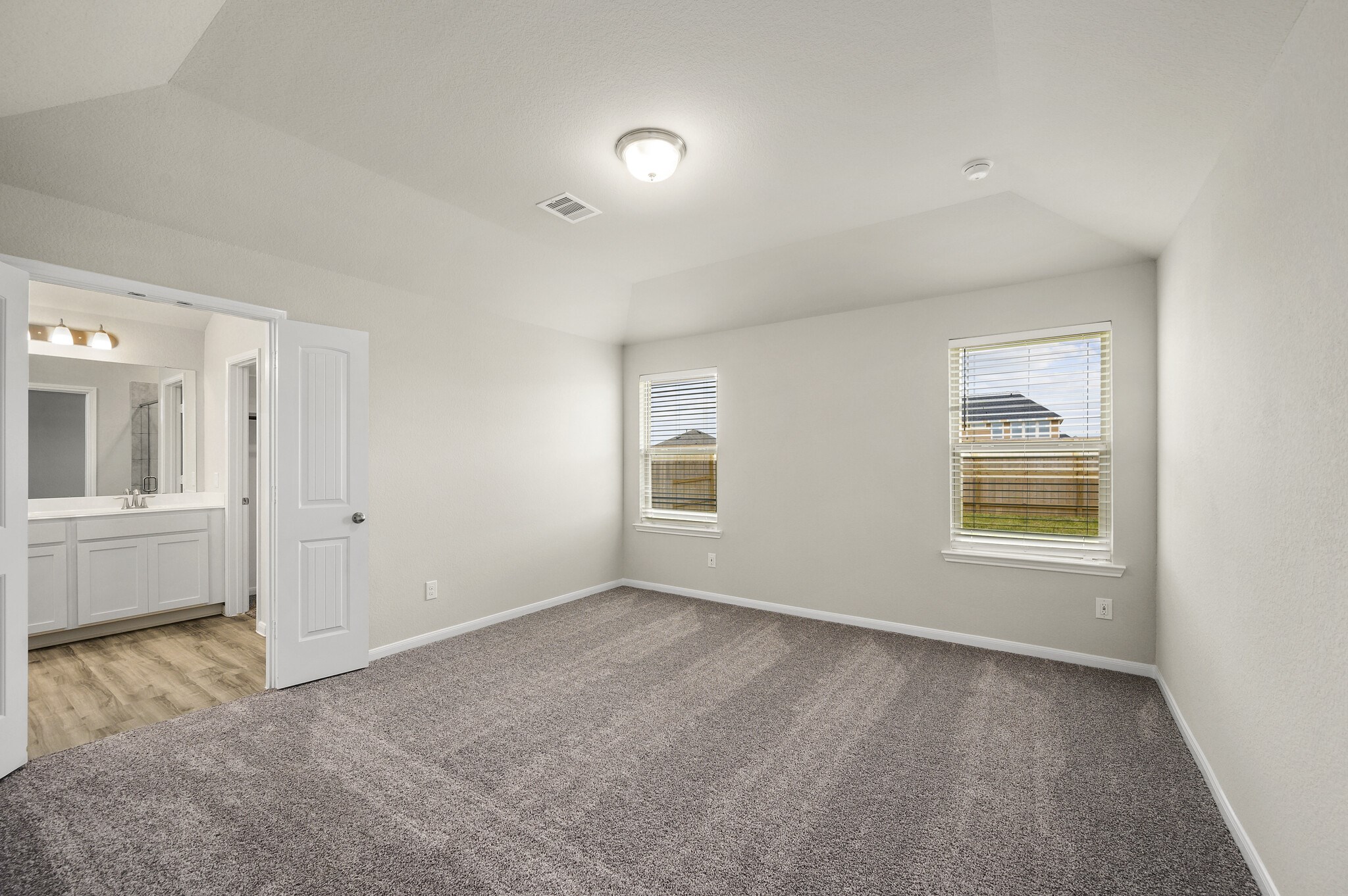 4507 Frontier Trail Baytown, TX 77521 - Photo 11 of 24 a view of an empty room with a window